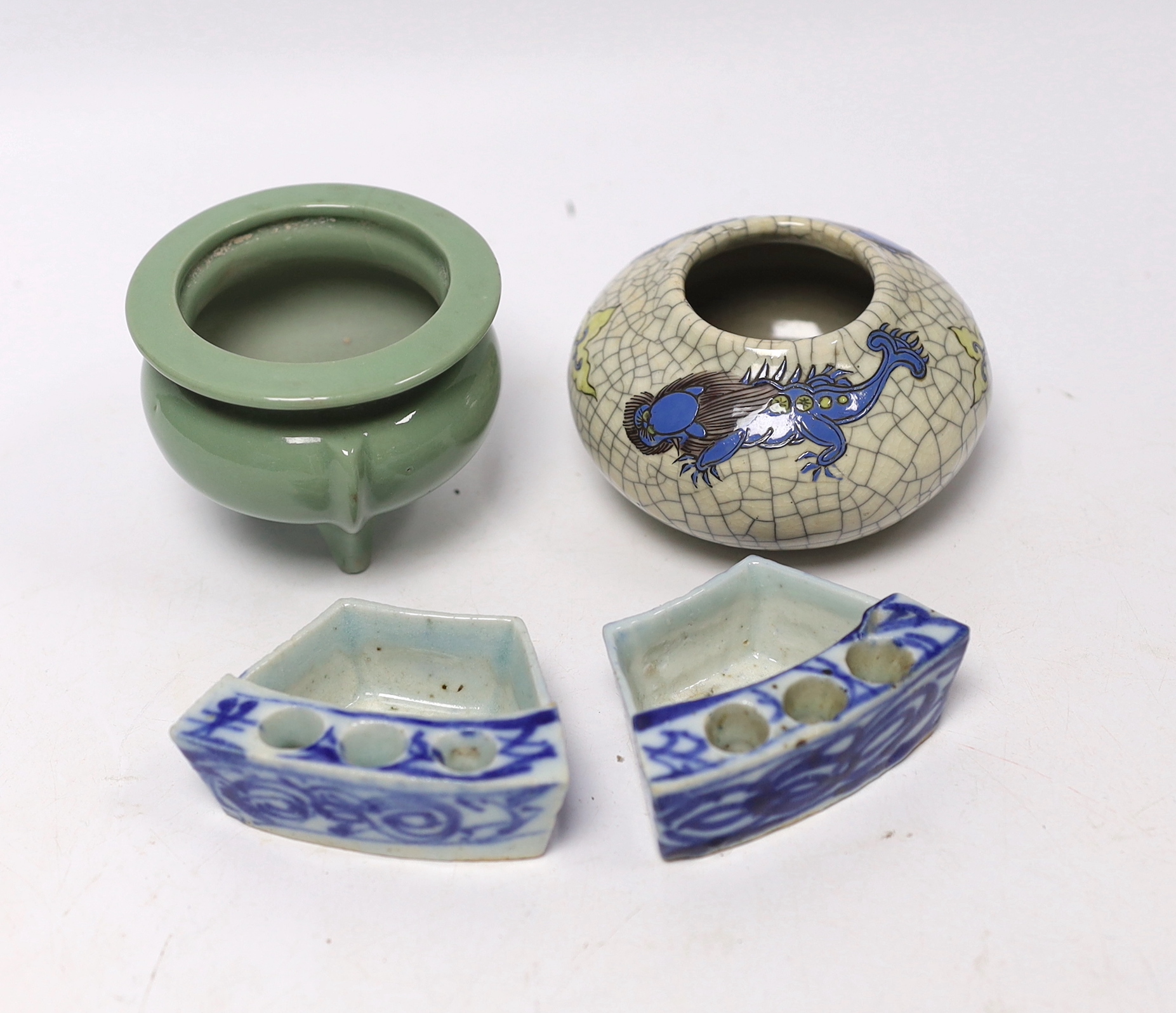 Four Chinese ceramic items; a celadon glazed tripod censer, a miniature vase and two incense holders, censer 5.5cm high